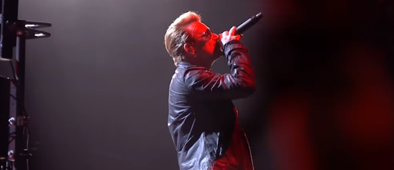 Bono verrast bij Snow Patrol-concert